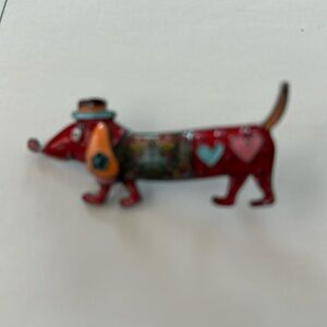 Whimsical dachshund pin in painted enamel. Great Easter egg filler surprise